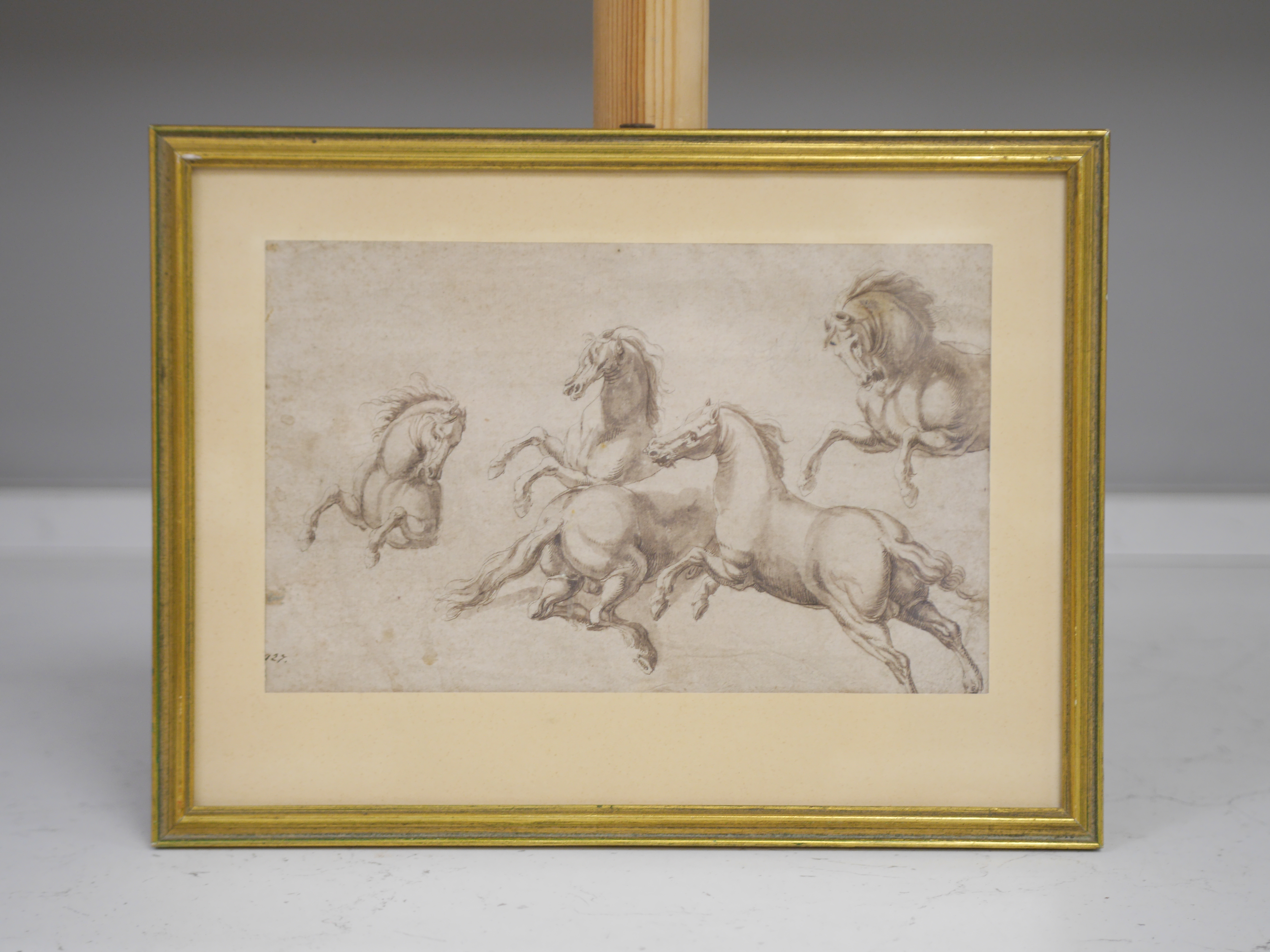 Late 17th century Old Master, ink and wash on buff paper, Studies of horses, partial inscription lower left obscured by the mount, 16 x 25cm. Condition - fair